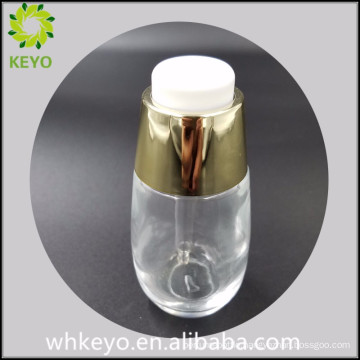 30ml Hot sale clear empty cosmetic glass bottle with press dropper